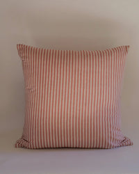 The Soil to Studio Babita Linen Pillow, 22 x 22 in Old Rose, features red and white vertical stripes and is shown against a plain light background.