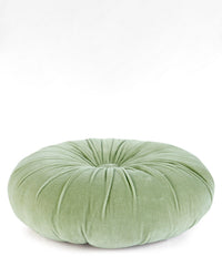 The Casa Amarosa Mini Velvet Round Pillow in Pistachio features a soft, plush texture and tufted center—an ideal decorative accent in light green, shown against a white background.