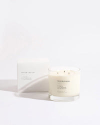 A Brooklyn Candle Studio Marrakech XL 3-Wick Candle, made of soy wax in a clear jar, is displayed with its matching Marrakech-labeled box against a light background.