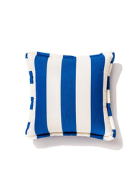 The Business & Pleasure Co Small Square Throw Pillow - Crew Mediterranean Blue features bold blue and white vertical stripes on a white background. Ideal for outdoor use, it’s spill and stain resistant for worry-free relaxation.