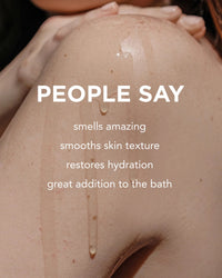 A close-up of a bare shoulder with water droplets. Text: PEOPLE SAY Rosie Jane Chill Body + Bath Oil smells amazing, restores hydration, smooths skin texture—perfect for bath or daily moisturizing.