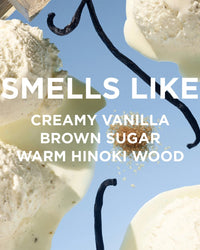 Scoops of vanilla ice cream with visible vanilla beans and brown sugar granules on a light blue background. Text: SMELLS LIKE CREAMY VANILLA, BROWN SUGAR, WARM HINOKI WOOD—just like Rosie Jane Perfume Oil in Dulce.