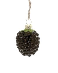 The Cody Foster Blackberry Ornament is a hand-crafted Christmas tree decoration featuring a glossy, textured blackberry shape, a green glittery top, and a twine loop for easy hanging.