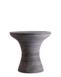 The Celeste 11 inch Pedestal Planter in Raw Grey by Bergs Potter features a round, hourglass shape with a flat top and flared base—ideal as a modern plant pedestal or stylish accent table.