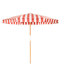 The Amalfi Umbrella - Crew Le Sirenuse Stripe by Business & Pleasure Co features a red and white stripe pattern, wooden pole, and UV resistant canopy, shown against a white background.