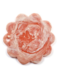 The Casa Amarosa 12in Scallop Resin Cheese/Charcuterie Board in Pink features a stylish marbled design with a scalloped edge and a hanging hole—perfect as a handmade centerpiece for any kitchen.