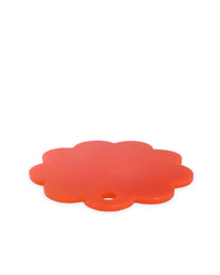 The Casa Amarosa 9in Scallop Resin Cheese/Charcuterie Board in Orange features a flower shape and a handy edge hole—ideal as a handmade cheese board or charming serving tray. Shown on a white background.
