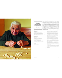 An elderly woman shapes finger pasta at a wooden table, with uncooked pieces before her and a yellow-green wall behind. On the right, text features Pasta Grannies: The Official Cookbook by Chronicle Books and Italian pasta recipes.