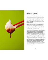 A pair of red chopsticks holds a dumpling over green with a drop of sauce beneath—ideal for easy sauce lovers. Saucy by Chronicle Books is introduced with text on the right side of the image.