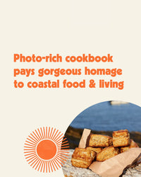 Sea Lovers Cookbook by Chronicle Books offers stunning coastal recipes and visuals. Stacked golden biscuits on parchment with a seaside view inspire those looking to embrace sustainable coastal cooking.