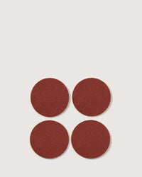 The graf lantz Bierfilzl Merino Wool Round Coaster Solid in Terracotta (4 Pack) features four elegant, sustainably crafted coasters—perfect for adding style and function to your home décor.