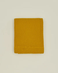 Hawkins New York Simple Waffle Shower Curtain in Mustard