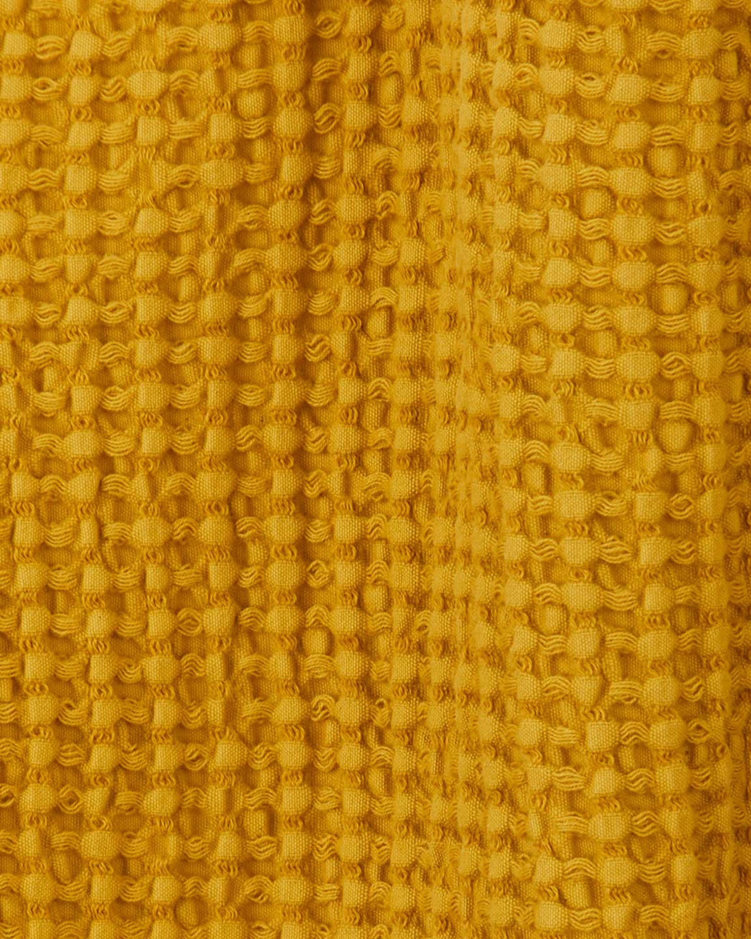 Hawkins New York Simple Waffle Shower Curtain in Mustard