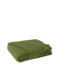 The Lands Downunder Brushed Mohair Throw in Fern, featuring a soft, fuzzy texture and woven in New Zealand, is neatly folded and displayed against a plain white background.