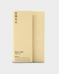 Onyx Coffee Lab Mao Jian Tea | 12 Sachets: Minimalist beige box featuring Chinese and English text; Chinese green tea from Henan with wildflower, hazelnut, and fresh flavor notes.