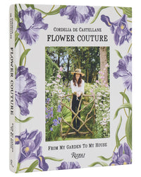 The cover of Flower Couture by Random House features a woman in a flower-filled garden with purple floral borders, capturing the elegance of a French country house and inspiring creative floral arrangements.