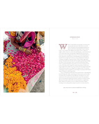 Book interior with floral arrangement on left and text on right
