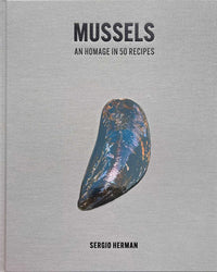 The cookbook Mussels by Simon & Schuster features a single mussel shell on a simple grey cover—ideal for those seeking creative ways to cook mussels.