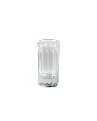 The SIR / MADAM Empire Nips Ice Set/4 features clear glass tumblers with thick bases and vertical ridges, perfect for serving drinks or adding elegance to your bar cart.