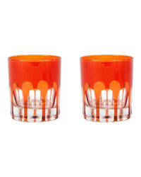 Two SIR / MADAM Rialto Glass Old Fashion Lolita glasses, each featuring an orange-tinted upper half and a transparent faceted base, are displayed side by side on a white background.