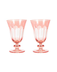 The Rialto Glass Tulip Kitten Set/2 by SIR / MADAM features two pink, footed goblets with fluted sides, displayed side by side against a white background to highlight their elegant hand-finished details.