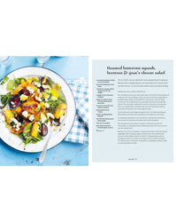 Picnic by Simon & Schuster sits on a blue and white tablecloth next to a roasted vegetable salad, offering perfect inspiration for alfresco dining or your next picnic recipe.
