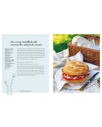 A recipe page for a hot crusty loaf with mozzarella, salami, and tomato appears beside a sandwich photo—layers visible—on a cloth with a picnic basket, featuring “Picnic” by Simon & Schuster as inspiration for outdoor dining.