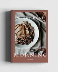 Wonderful Morning – Recipes For A Delicious Start To the Day by Cozy Publishing features a cover with granola, yogurt, poached pear, and berries—ideal for anyone looking for tasty breakfast ideas.