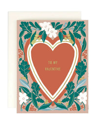The Amy Heitman "To My Valentine" single card features a large red heart with gold foil and white outline, "TO MY VALENTINE" in gold, green leaves and white flowers on a pink background, plus an envelope; blank inside for your message.