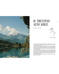A tranquil alpine lake mirrors green hills and snowy peaks below a cloudy sky. Beside it, the text “Trentino-Alto Adige, an Italian gem,” appears with a map highlighting the region. Product: Travel Guide: Somewhere in Italy by Cozy Publishing.