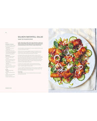 A page from Thai Made Easy by Chronicle Books displays a Salmon Waterfall Salad recipe. On the right, crispy salmon fillets with herbs, red onion, and cucumber are featured; the recipe text appears on the left.