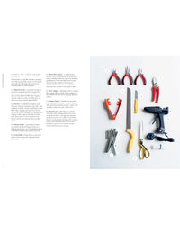 A set of floral design tools from The Flower School by Chronicle Books is neatly arranged on a white background—pliers, cutters, knives, saw, glue gun, scissors, screwdriver. Tool descriptions appear on the left side of the image.