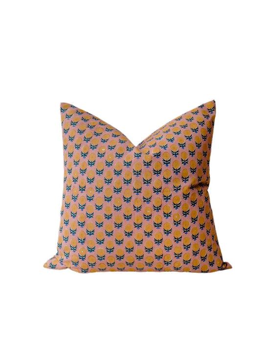 The Pakhi Linen Pillow by Soil to Studio is an 18 x 18 in handmade pillowcase crafted from vintage sari, featuring a peach background with blue and black floral patterns, displayed on a plain white backdrop.