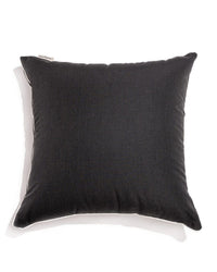 The Euro Throw Pillow - Rivie Black by Business & Pleasure Co is a square, dark gray pillow with smooth, spill-resistant fabric, slightly rounded corners, and a small fabric tag on the upper left edge, shown against a white background.