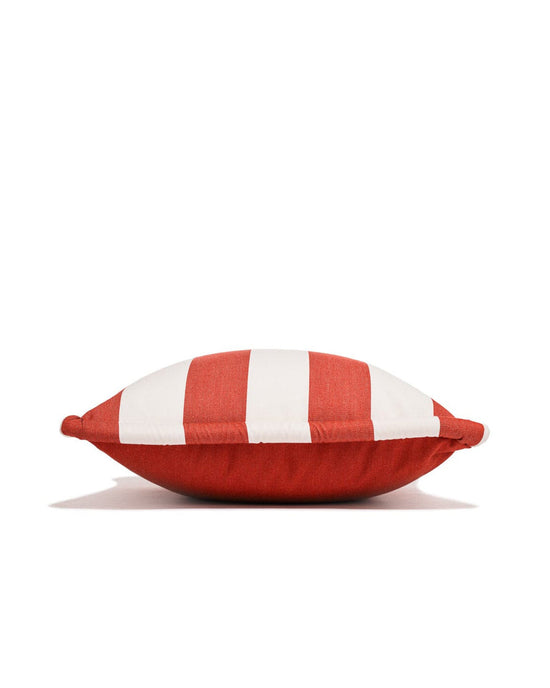 The Small Square Throw Pillow - Crew Le Sirenuse Stripe by Business & Pleasure Co features bold red and white stripes and a flat, rectangular shape—perfect for mixing into your indoor or outdoor pillow collection.