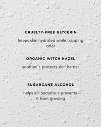 Text featuring skincare ingredients and benefits on a light backdrop with water droplets. Rosie Jane's Calm Full Body Deodorant for sensitive skin is aluminum-free and made with cruelty-free glycerin, organic witch hazel, and sugarcane alcohol.