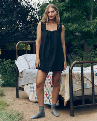 The Eyelet Mini Tank Dress in Black