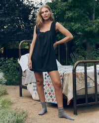 The Eyelet Mini Tank Dress in Black