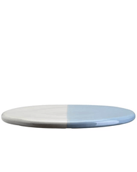 The Bergs Potter Nuna Glazed 11 inch Tray in Sandstone/Misty Blue features a round, two-tone glazed stoneware design—half white, half light blue—shown against a white background, ideal for chic home décor.