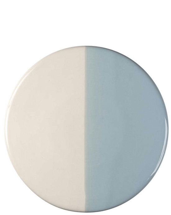 The Bergs Potter Nuna Glazed 11 inch Tray in Sandstone/Misty Blue features a round, evenly divided ceramic design—half light cream, half pale blue—crafted from glazed stoneware to enhance your home décor.