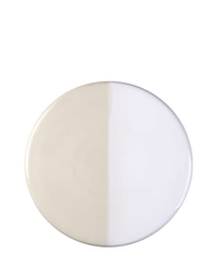 The Nuna Glazed 7.9 inch Tray in Sandstone/Mineral White by Bergs Potter features a round stoneware design seen from above, split evenly down the center with one side off-white and the other white—showcasing Bergs Potters signature style.