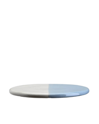 The Bergs Potter Nuna Glazed 7.9 inch Tray in Sandstone/Misty Blue is a round, flat ceramic plate with one half white and the other light blue, showcased against a plain white background.