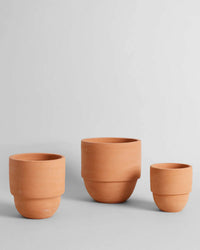 The Bloomist Big Cuff Planter | Large is shown unglazed on a white background, perfect for indoor or outdoor use and complements any décor.