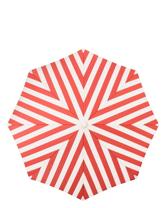 A top-down view of the Amalfi Umbrella - Crew Le Sirenuse Stripe by Business & Pleasure Co, showcasing its geometric red and white stripes. This UV-resistant beach umbrella combines style with sun protection.