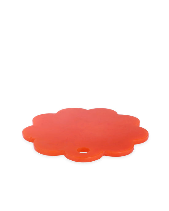 The Casa Amarosa 9in Scallop Resin Cheese/Charcuterie Board in Orange features a flower shape and a handy edge hole—ideal as a handmade cheese board or charming serving tray. Shown on a white background.