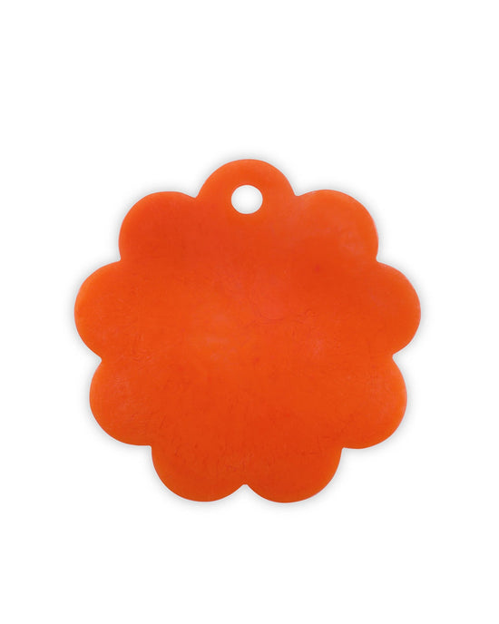 An orange, flower-shaped plastic tag with a hole near the edge, shown on white—ideal for labeling Casa Amarosas 9in Scallop Resin Cheese/Charcuterie Board in Orange.