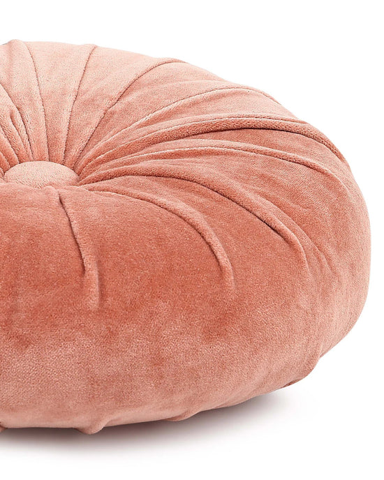 The Casa Amarosa Mini Velvet Round Pillow in Blush Pink features decorative pleats and a central button, adding a touch of elegance to any white background.