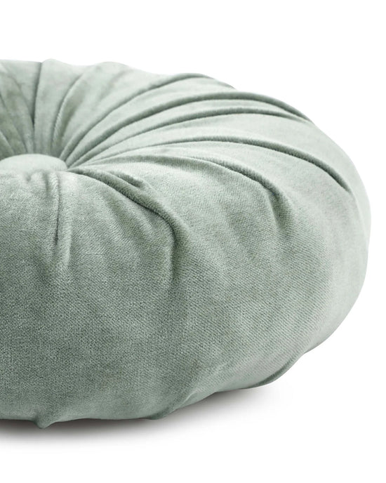 Close-up of the Casa Amarosa Mini Velvet Round Pillow in Sage Green, featuring hand-stitched details, gathered fabric design, and a central button—ideal as a decorative accent.