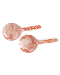 The Casa Amarosa Resin Short Salad Server Set in Pink features two pink marbled resin servers with round, flat heads and beaded handles, shown on a white background.