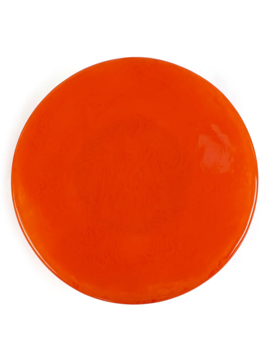 The Casa Amarosa Scallop Resin Cake Stand in Orange, featuring a glossy finish and unique scalloped design, is centered on a white background.
